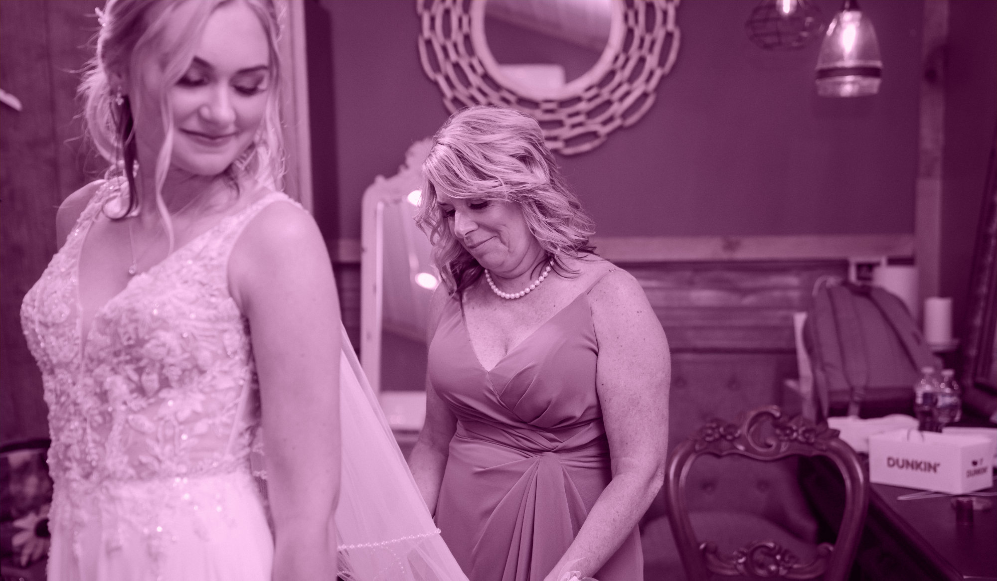 Mother and Daughter enjoying a moment, showing the beauty of Cara's dress